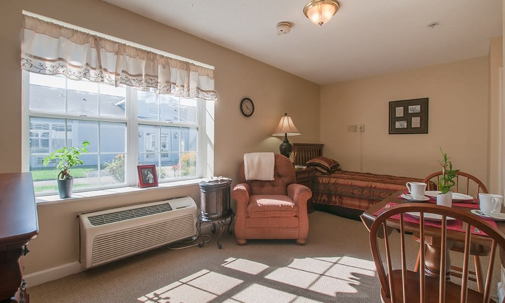 Resident living room in senior living apartment at Randall Residence of Troy in Troy, Ohio
