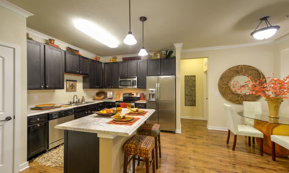Kitchen with island and lots of counter space at Hacienda Club in Jacksonville, FL