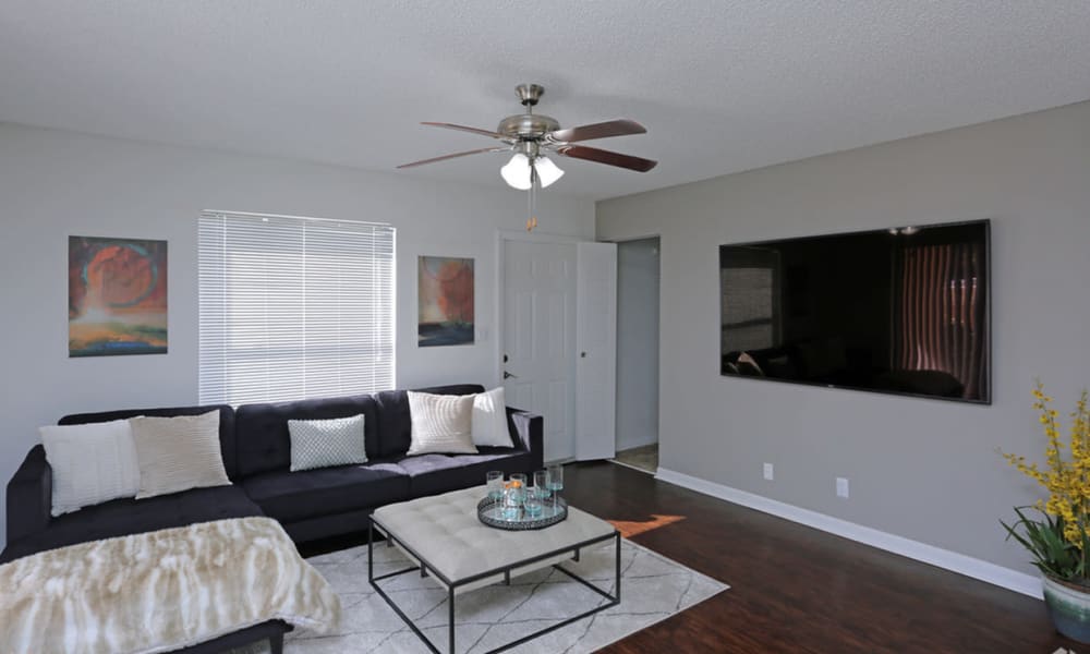Living room in a model home at Savannah Place Apartments & Townhomes in Boca Raton, Florida