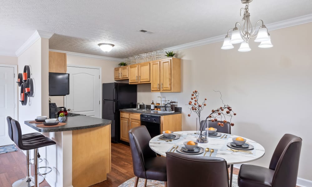 Modern kitchen and dining area at Lakefront at West Chester in West Chester, Ohio