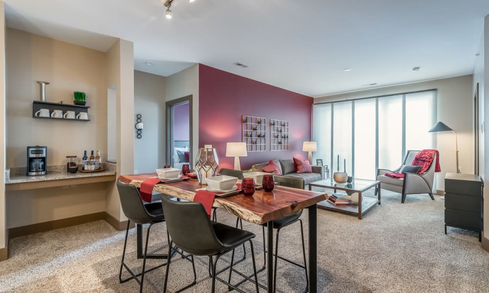 Carpeted living room at Latitude at Deerfield Crossing in Mason, Ohio