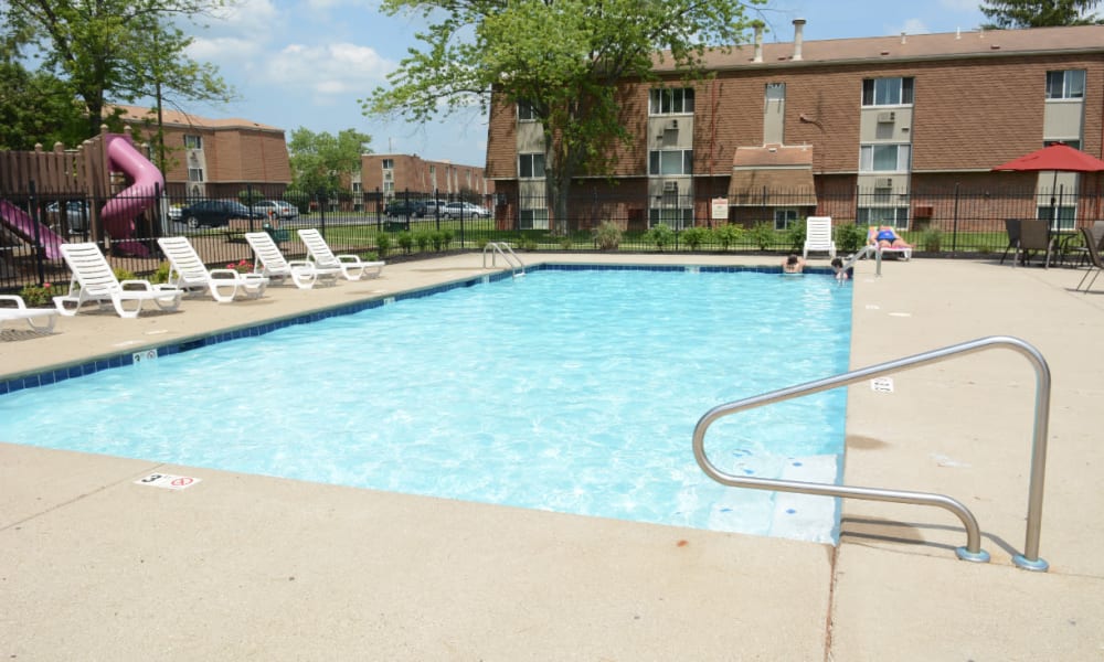 A large swimming pool with a sundeck at Northgate Meadows Apartments in Cincinnati, Ohio