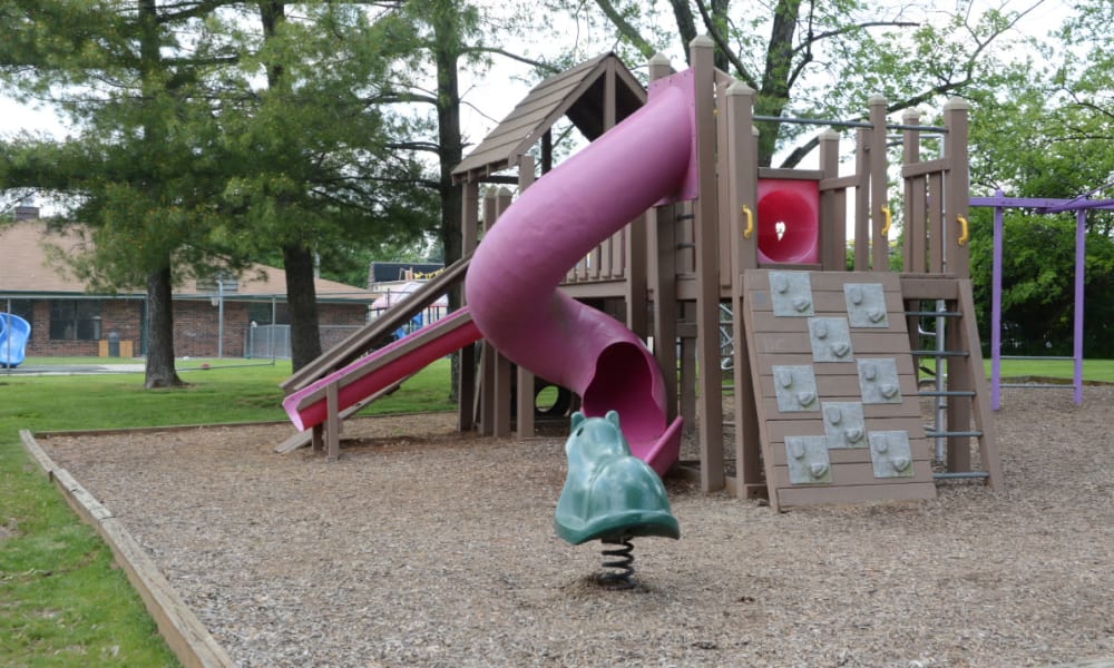 A children's playground with a slide at Northgate Meadows Apartments in Cincinnati, Ohio