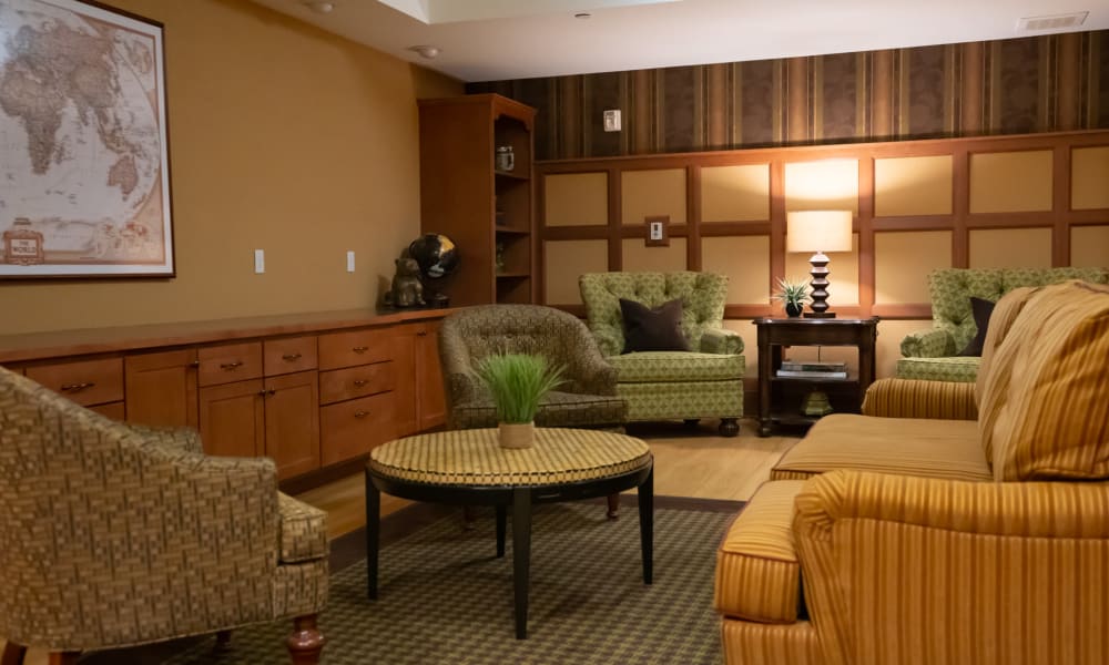 Coffee table surrounded by plush seating at York Gardens in Edina, Minnesota