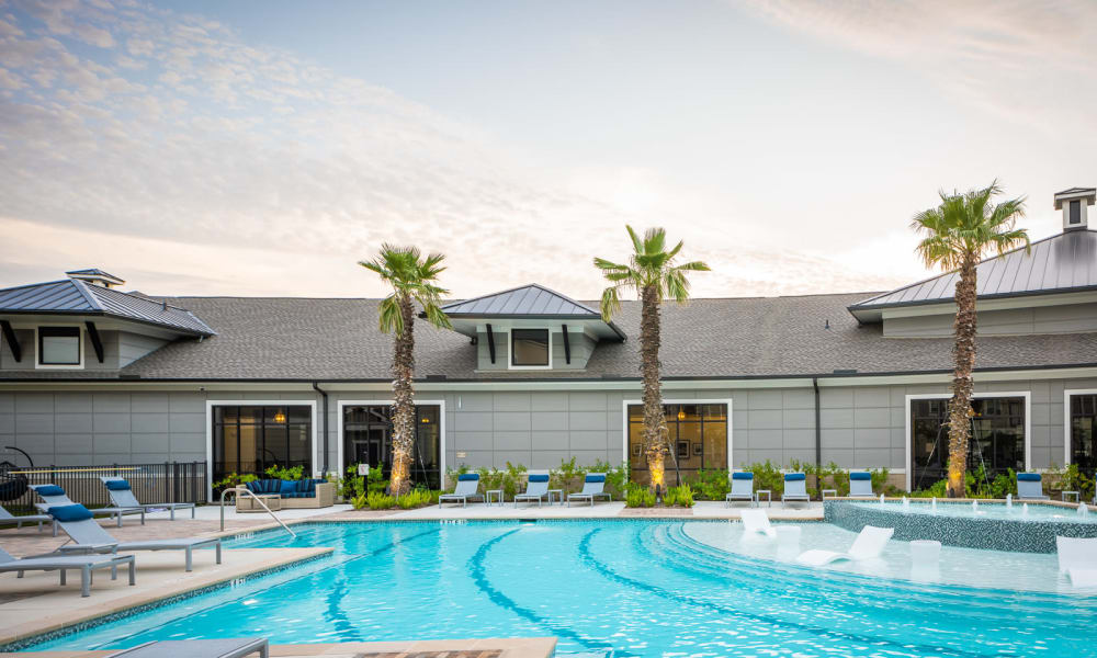 Sparkling swimming pool at Bellrock Market Station in Katy, Texas