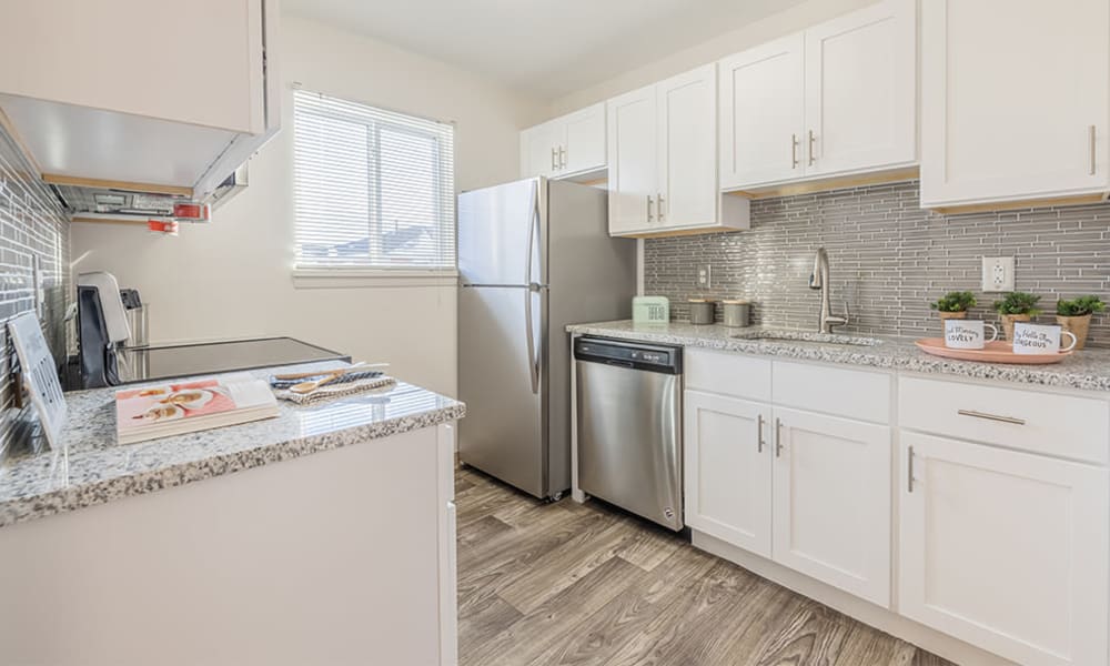 Fully-equipped kitchen at Waverlywood Apartments & Townhomes in Webster, New York