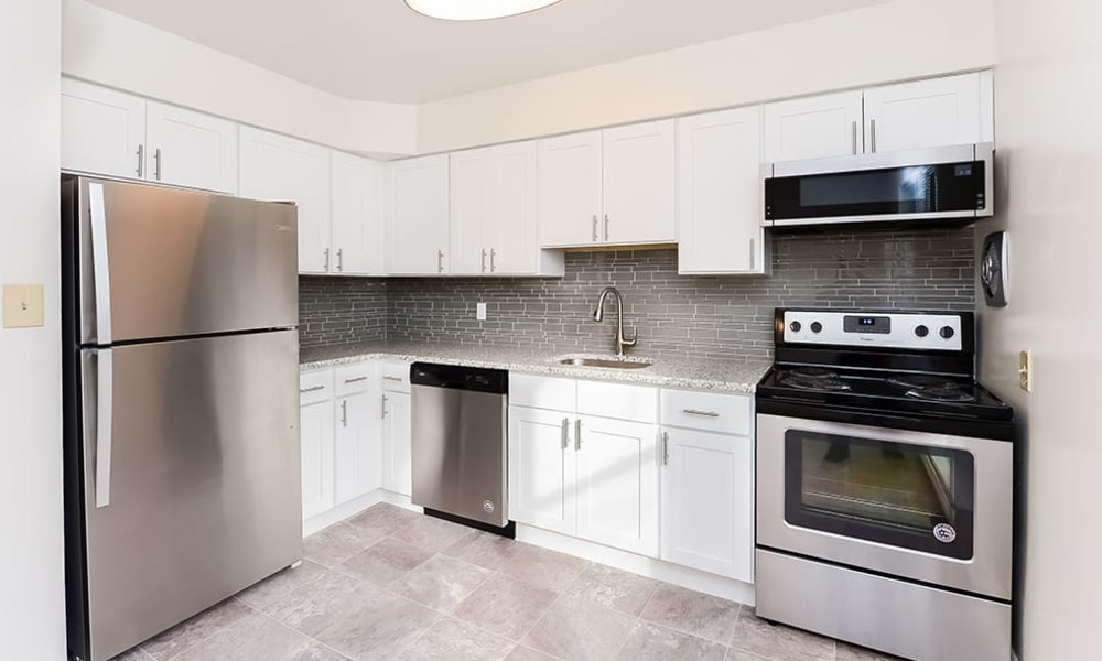 Fully-equipped kitchen at Brockport Crossings Apartments & Townhomes in Brockport, New York