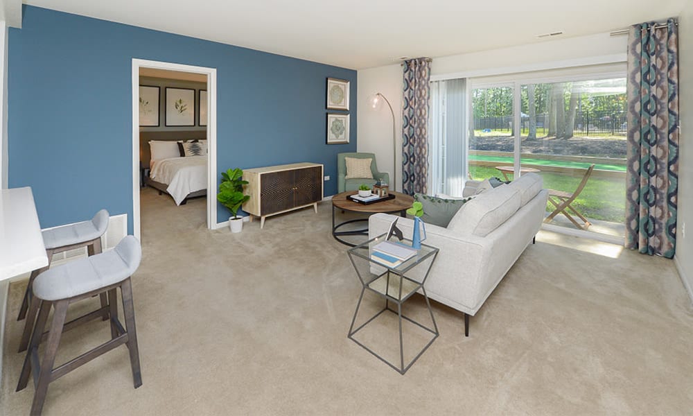 Naturally well-lit living room  at The Landings Apartment Homes in Absecon, New Jersey