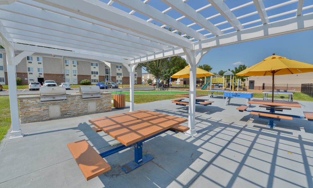 Outdoor Picnic Tables at William Penn Village Apartment Homes in New Castle, Delaware