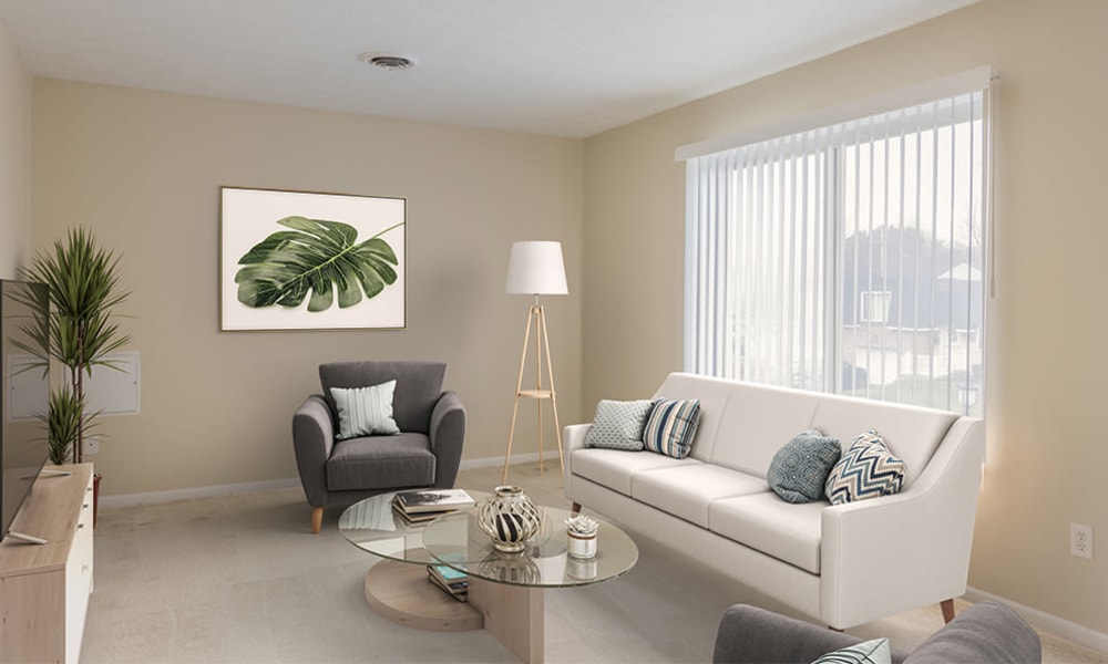Naturally well-lit living room at Newcastle Apartments & Townhomes home in Rochester, New York
