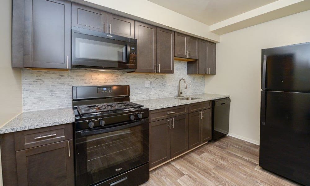 Equipped kitchen at The Village of Chartleytowne Apartments & Townhomes
