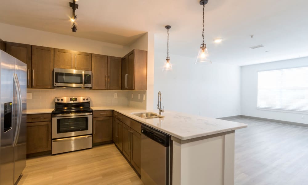 Kitchen and spacious living room at Block Lofts | Apartments in Atlanta, Georgia