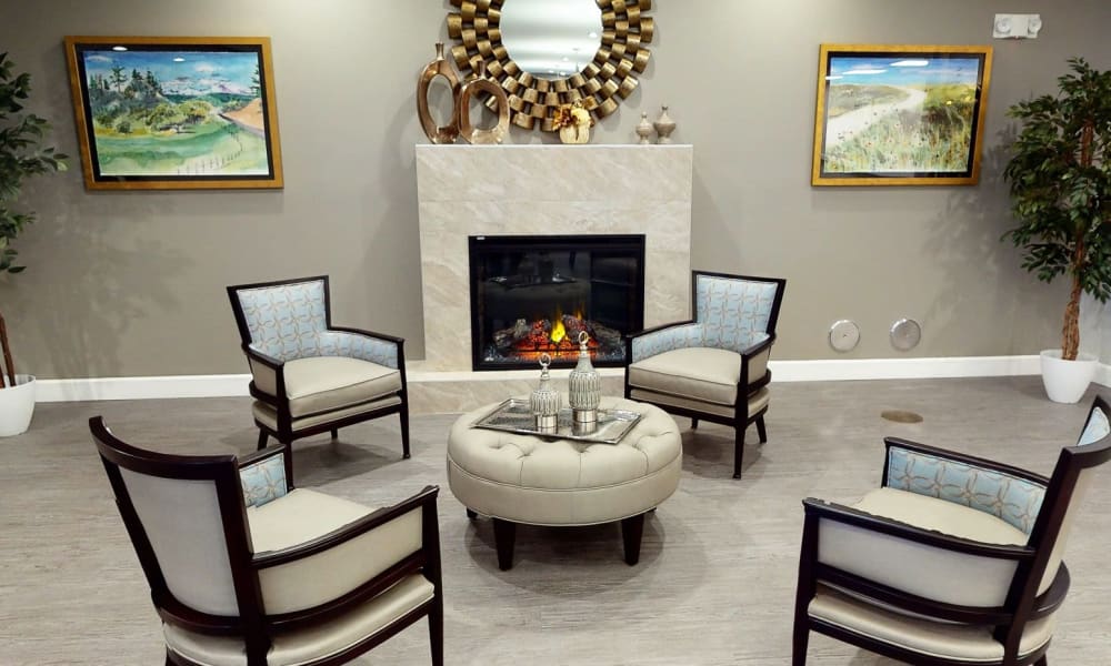 Dining area near fireplace at Keystone Place at Richland Creek in O'Fallon, Illinois