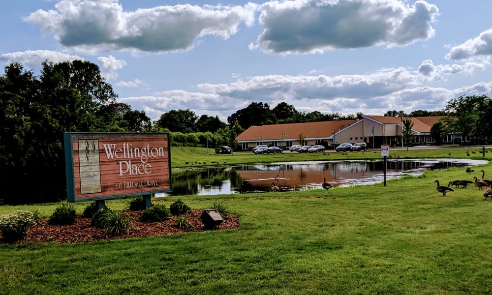 Property exterior and signage at Wellington Place at Hartford in Hartford, Wisconsin