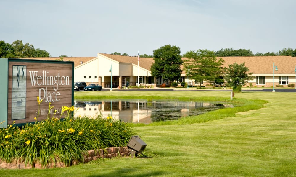 Signage and landscaping at Wellington Place at Hartford in Hartford, Wisconsin