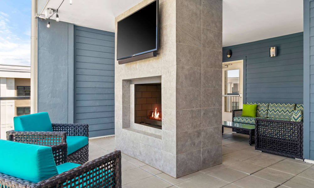 Outdoor lounge with a TV at Reserve Decatur | Luxury Apartments in Decatur, Georgia