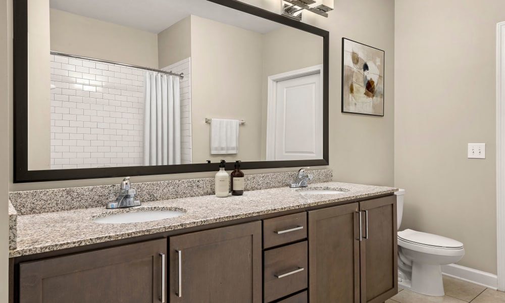 Bathroom with double sinks at Reserve Decatur | Luxury Apartments in Decatur, Georgia