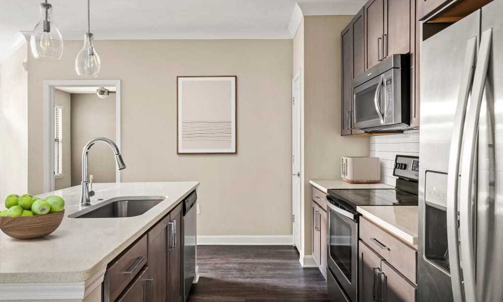 Kitchen with modern appliances at Reserve Decatur | Luxury Apartments in Decatur, Georgia