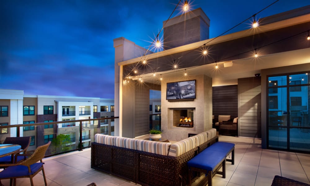 Outdoor lounge with a fireplace at Reserve Decatur | Luxury Apartments in Decatur, Georgia