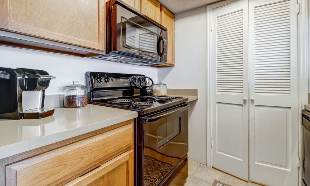 Kitchen at Peppertree Apartment Homes in Lafayette, Louisiana