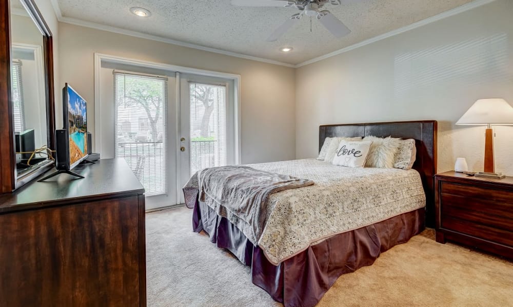 Spacious bedroom at Peppertree Apartment Homes in Lafayette, Louisiana
