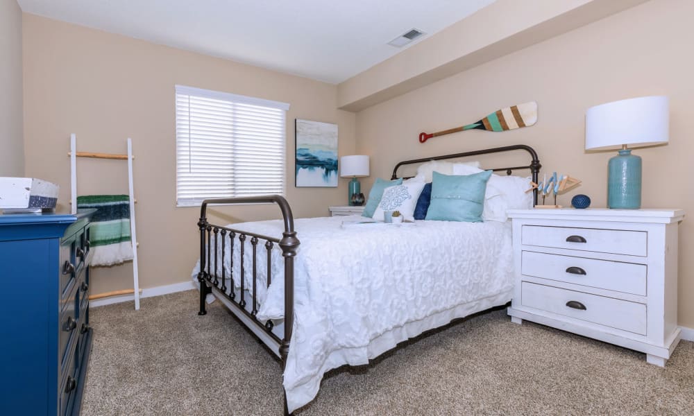 Spacious model bedroom with plush carpeting at Lakeside Crossing at Eagle Creek in Indianapolis, Indiana