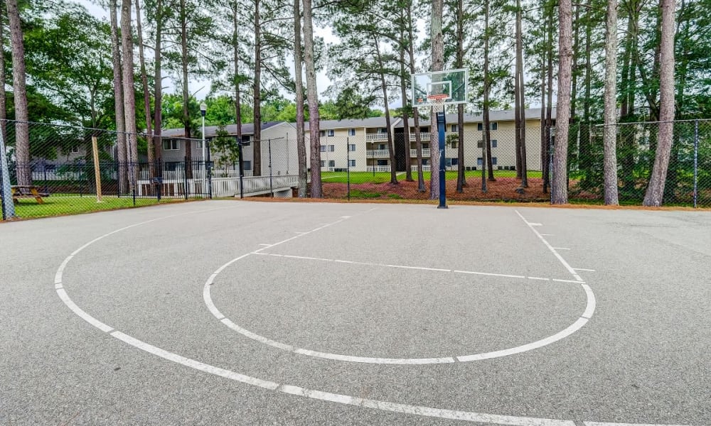 Fenced in basketball court at Forestbrook Apartments & Townhomes in West Columbia, South Carolina