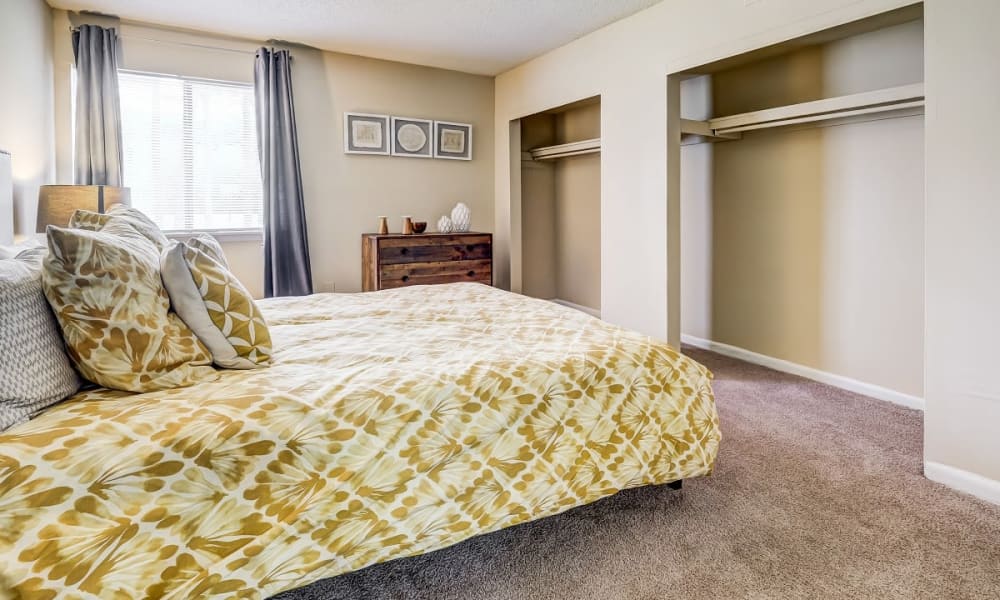 Spacious bedroom with open closets at Forestbrook Apartments & Townhomes in West Columbia, South Carolina
