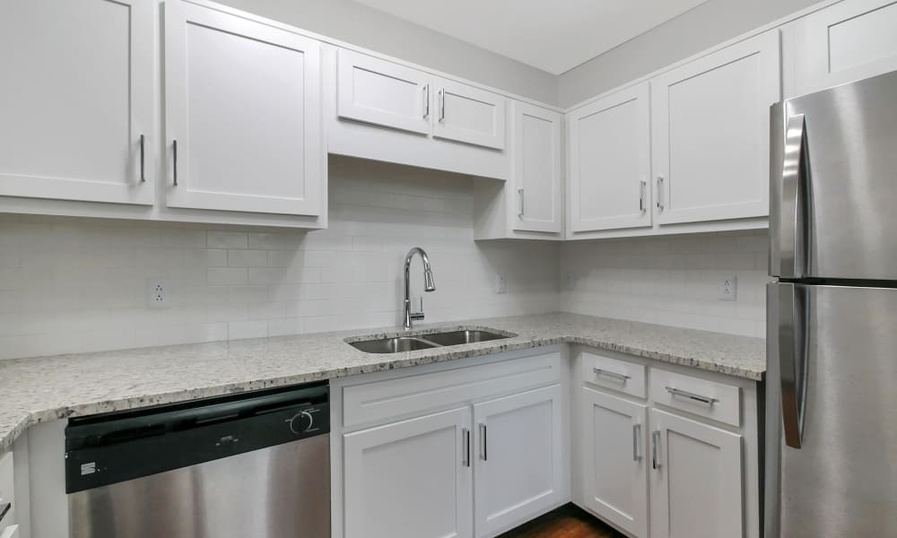 Kitchen with updated cabinets at The Grand Apartments in Chattanooga, Tennessee