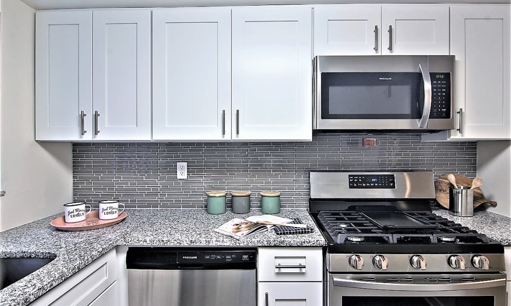 kitchen with white cabinets and stainless steel appliances