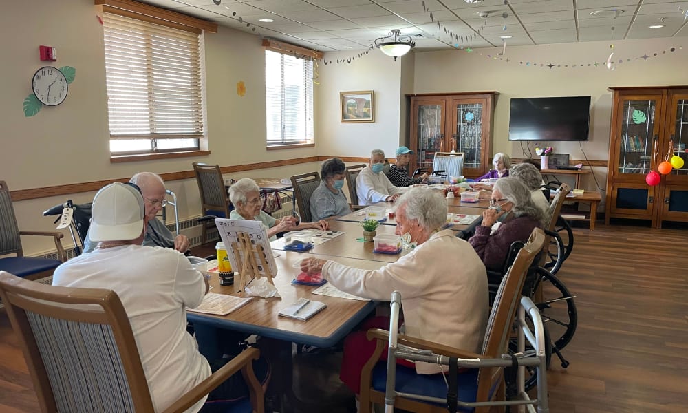Residents doing arts and crafts at Belle Reve Senior Living in Milford, Pennsylvania