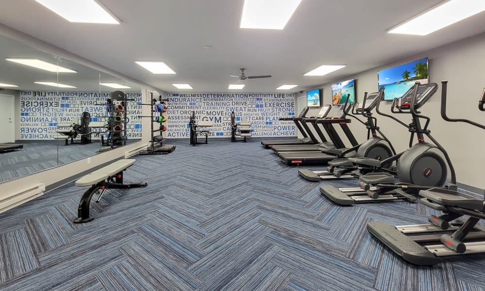 Well-equipped fitness center with cardio equipment at Westpointe Apartments in Pittsburgh, Pennsylvania