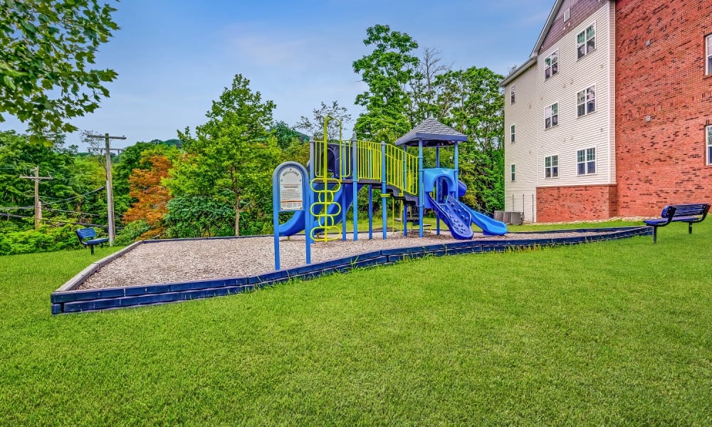 Apartments with a Playground equipped with a slide located at Marquis Place in Murrysville, Pennsylvania