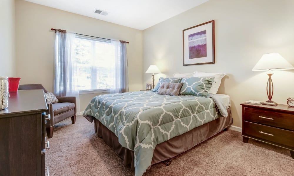 Luxurious and spacious bedroom with access to natural lighting at Marquis Place in Murrysville, Pennsylvania
