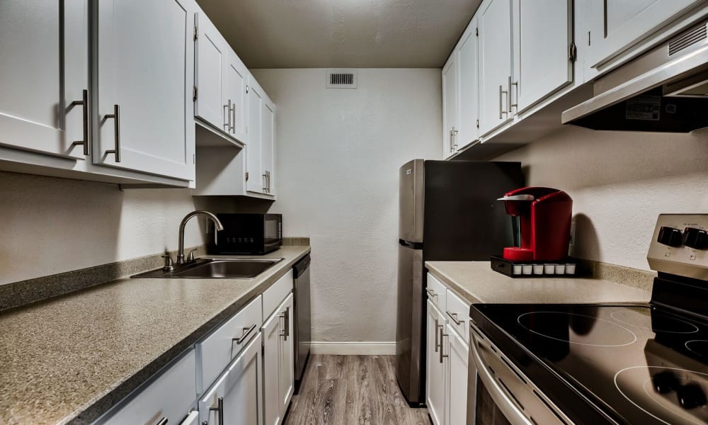 Modern kitchens and appliances at Vista Del Rey Apartments in Tacoma, Washington