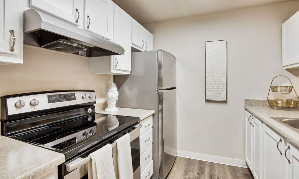 Modern kitchens and appliances at Crosspointe Apartments in Federal Way, Washington