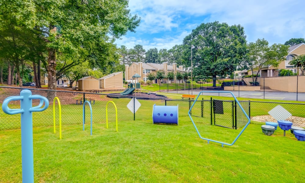 Dog park at Grove at Stonebrook Apartments & Townhomes in Norcross, Georgia