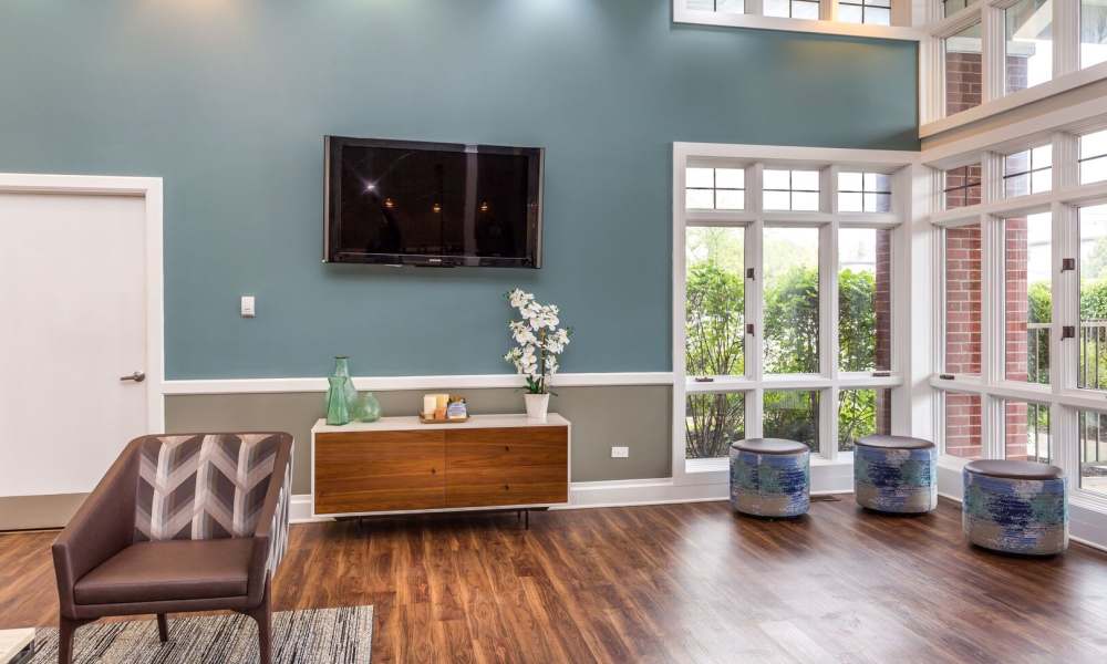 Resident lounge with television at Woodlake in Gurnee, Illinois