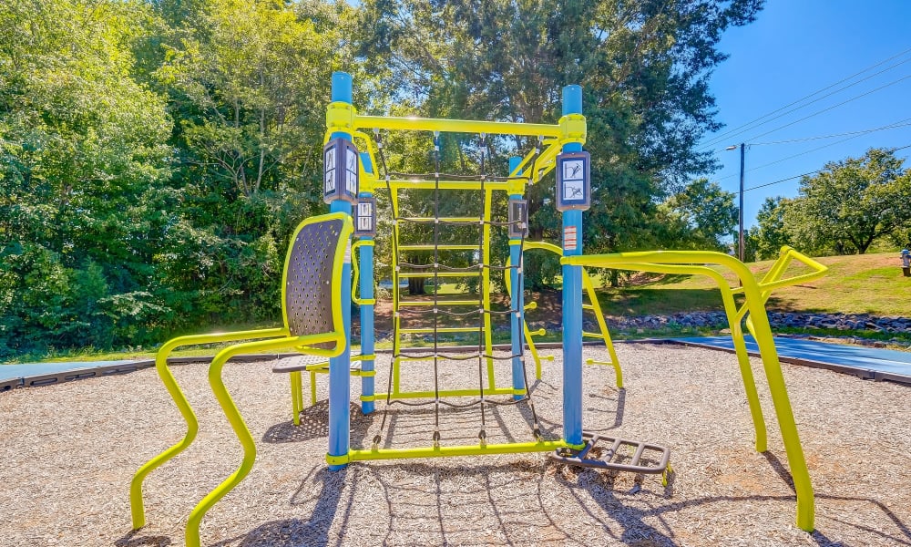 Apartments with a Playground equipped with a slide located at Lakewood Apartment Homes in Salisbury, North Carolina