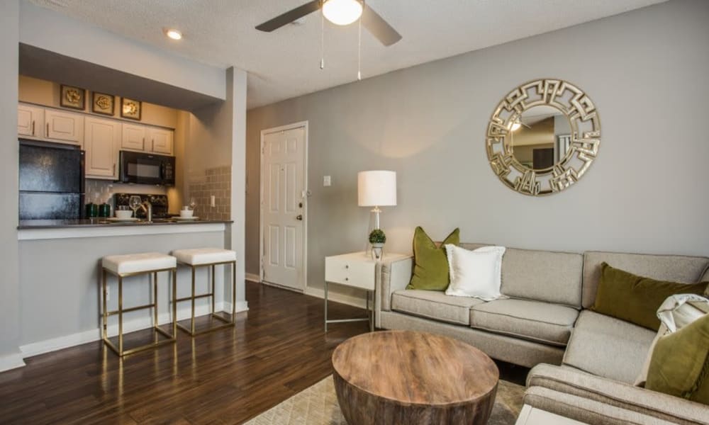 Well-furnished modern living space in a model apartment at Verandahs at Cliffside Apartments in Arlington, Texas
