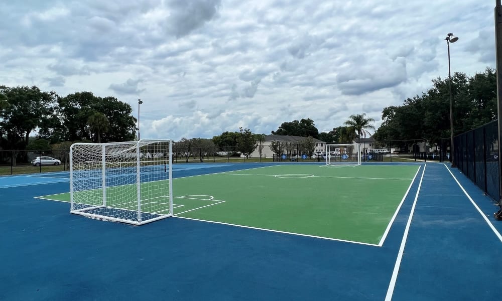 Outdoor tennis and soccer court at Park at Lake Magdalene Apartments & Townhomes in Tampa, Florida