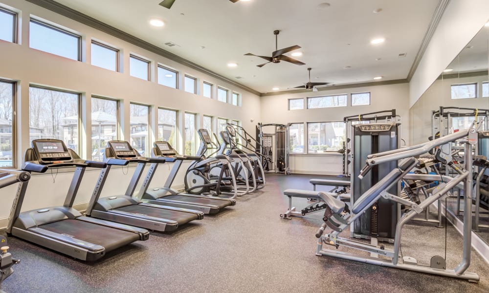 A row of treadmills in the fitness center at Brookside Heights Apartments in Cumming, Georgia