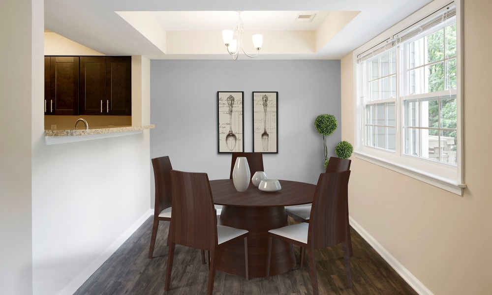 A decorated apartment dining room at Timberlawn Crescent in North Bethesda, Maryland