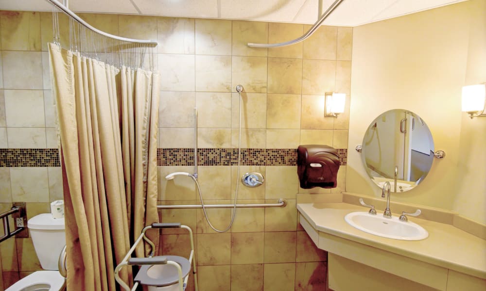Remodeled bathrooms are equipped for safety.