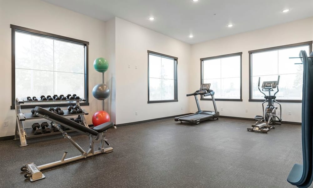  Exercise balls and wood floors in the fitness center at Wyndstone Apartments in Yelm, Washington