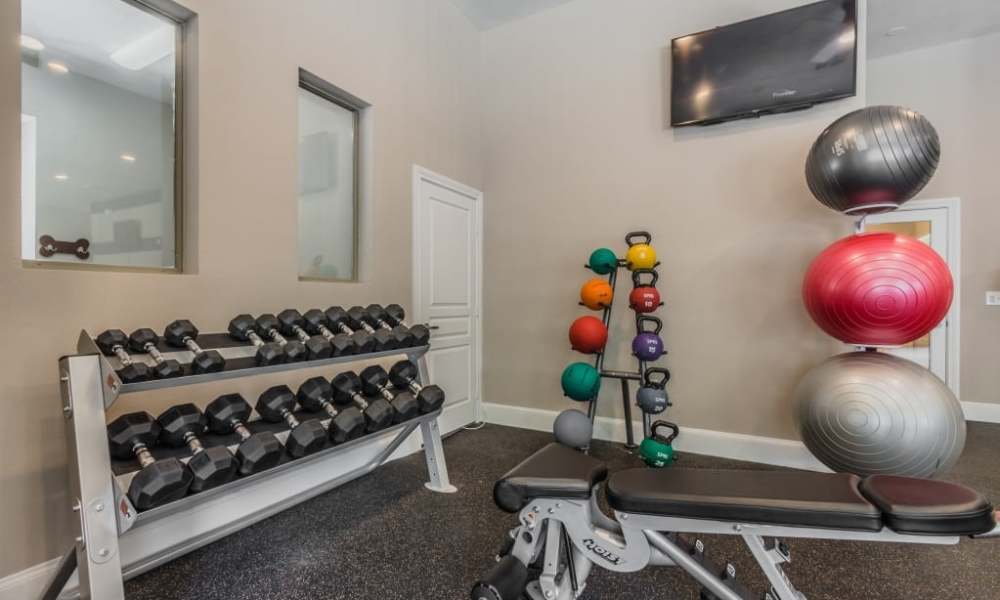Weights in the fitness center at The Livingston in Plano, Texas