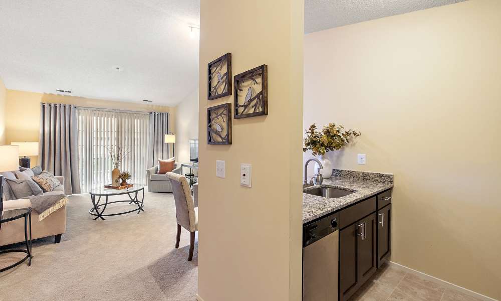 Living room adjacent to  kitchen at Rochester Hills, MI