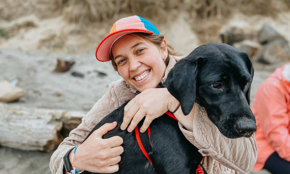 A resident and her dog out on a walk near Sorella in Denver, Colorado