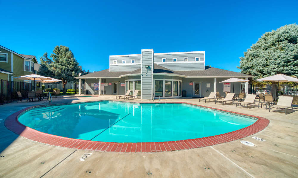 A tranquil pool accompanied by a well-designed patio area at Bristle Pointe Apartments in Reno, Nevada
