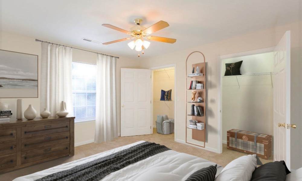 Bedroom with ceiling fan at Home Place Apartments in East Ridge, Tennessee